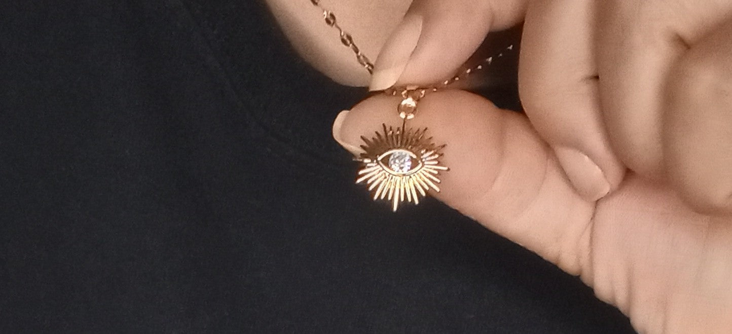 Gold eye necklace with Zircon Stone