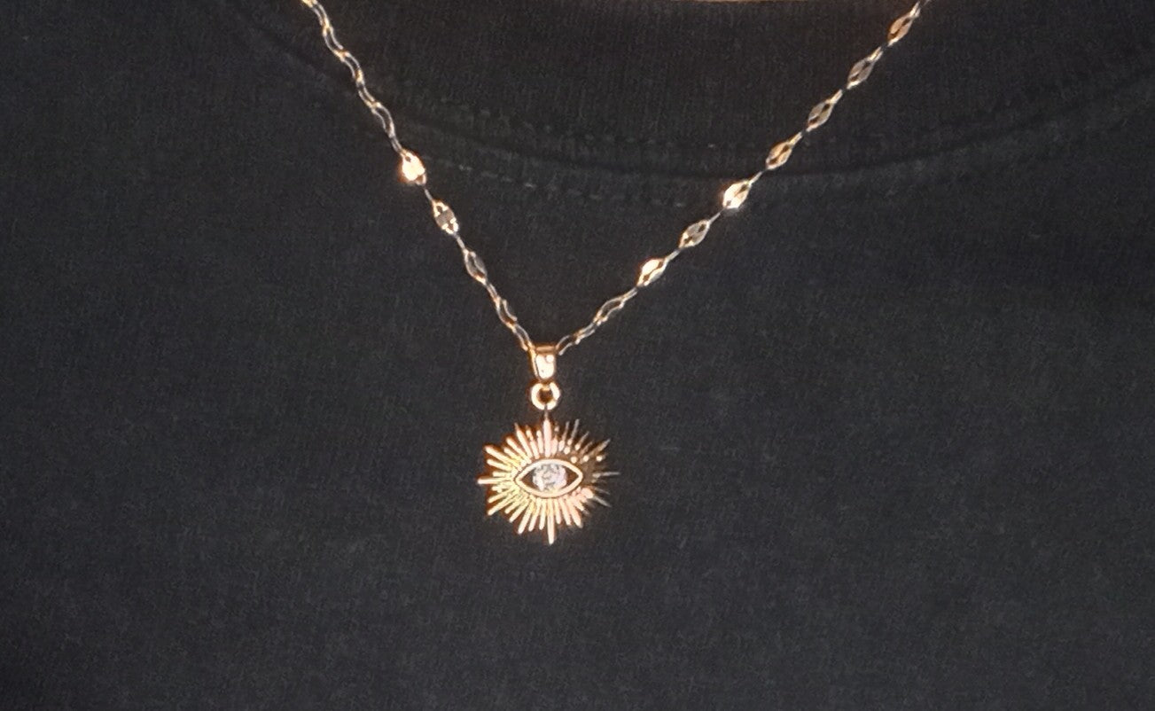 Gold eye necklace with Zircon Stone